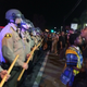 Demonstrators face police in El Cajon Wednesday night. Photo via AP